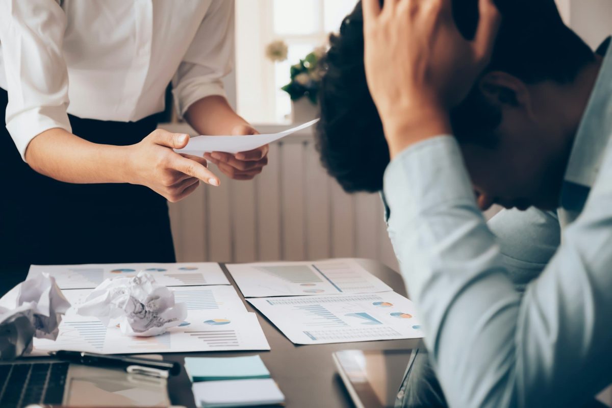 Disappointed or angry boss yelling at employee