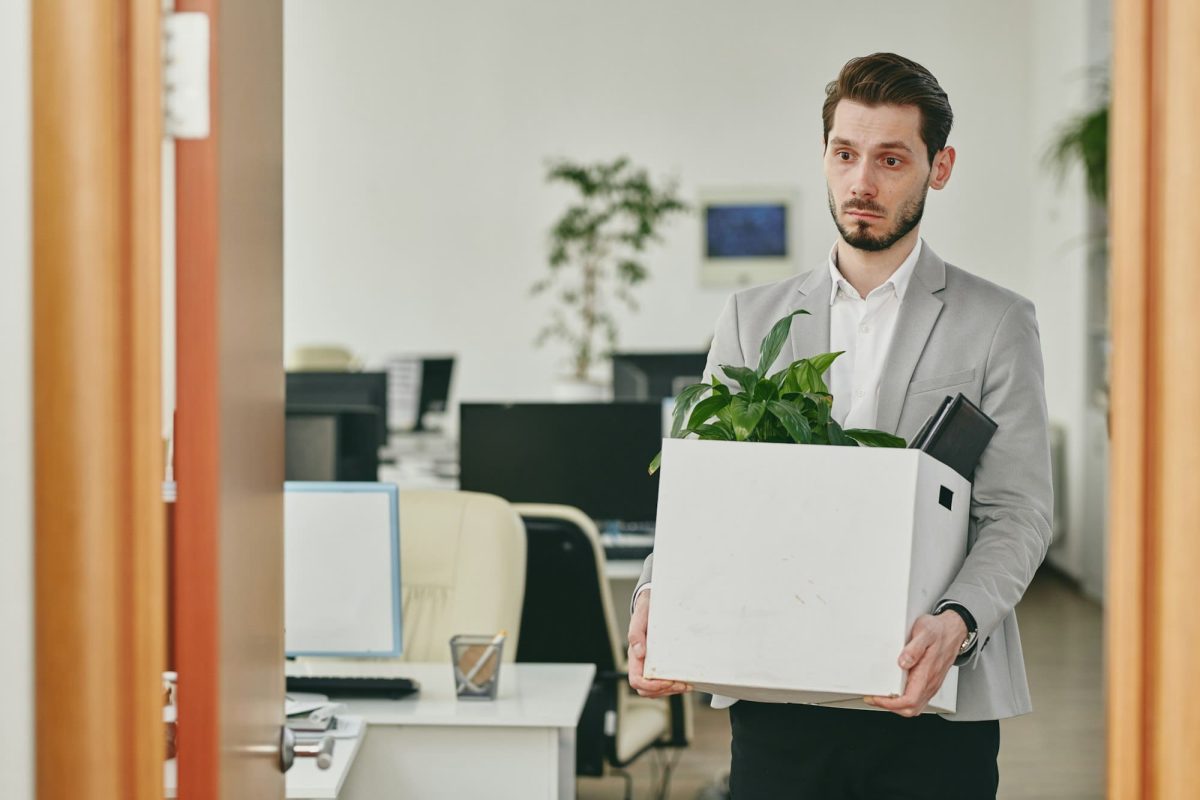 Dismissed man leaving office