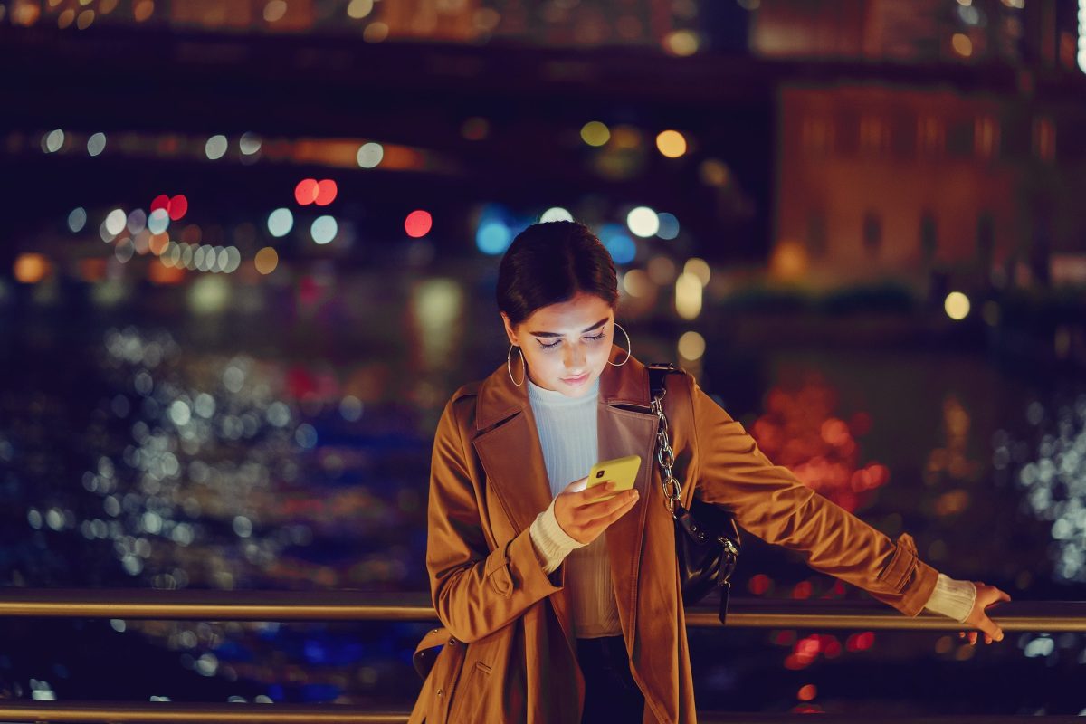 girl at night with phone