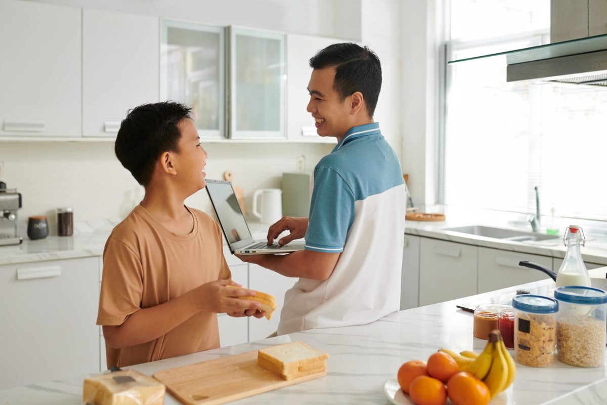 Son Cooking Breakfast for Father
